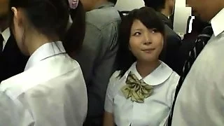 Japanese student gets naughty with a stranger in a bus